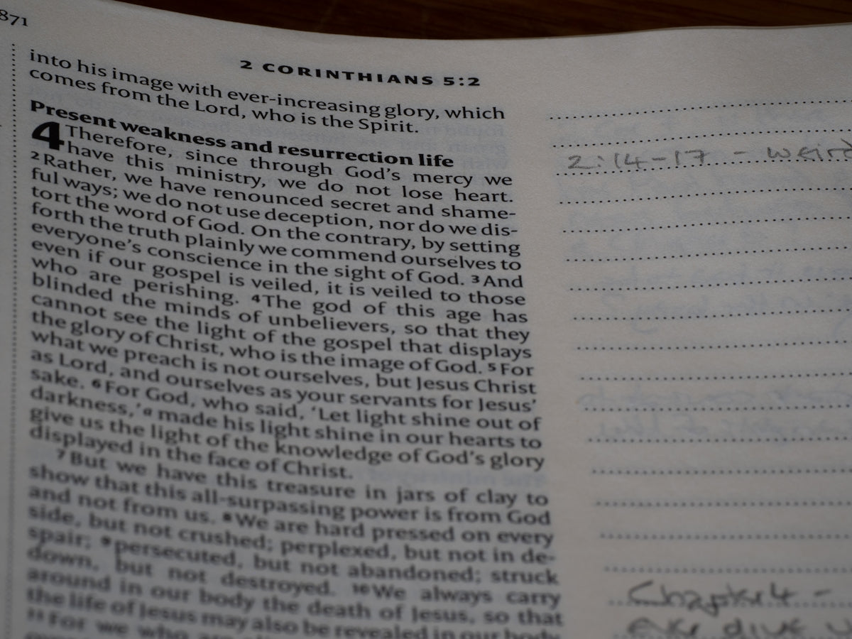 A close up of a book with writing on it